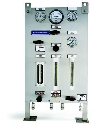 Control valve panel featuring pressure gauges, flow meters, and control knobs, designed for precise flow regulation in industrial applications.