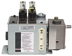 Industrial lubrication pump with dual reservoirs and control valves, designed for efficient lubrication in machinery and equipment maintenance.