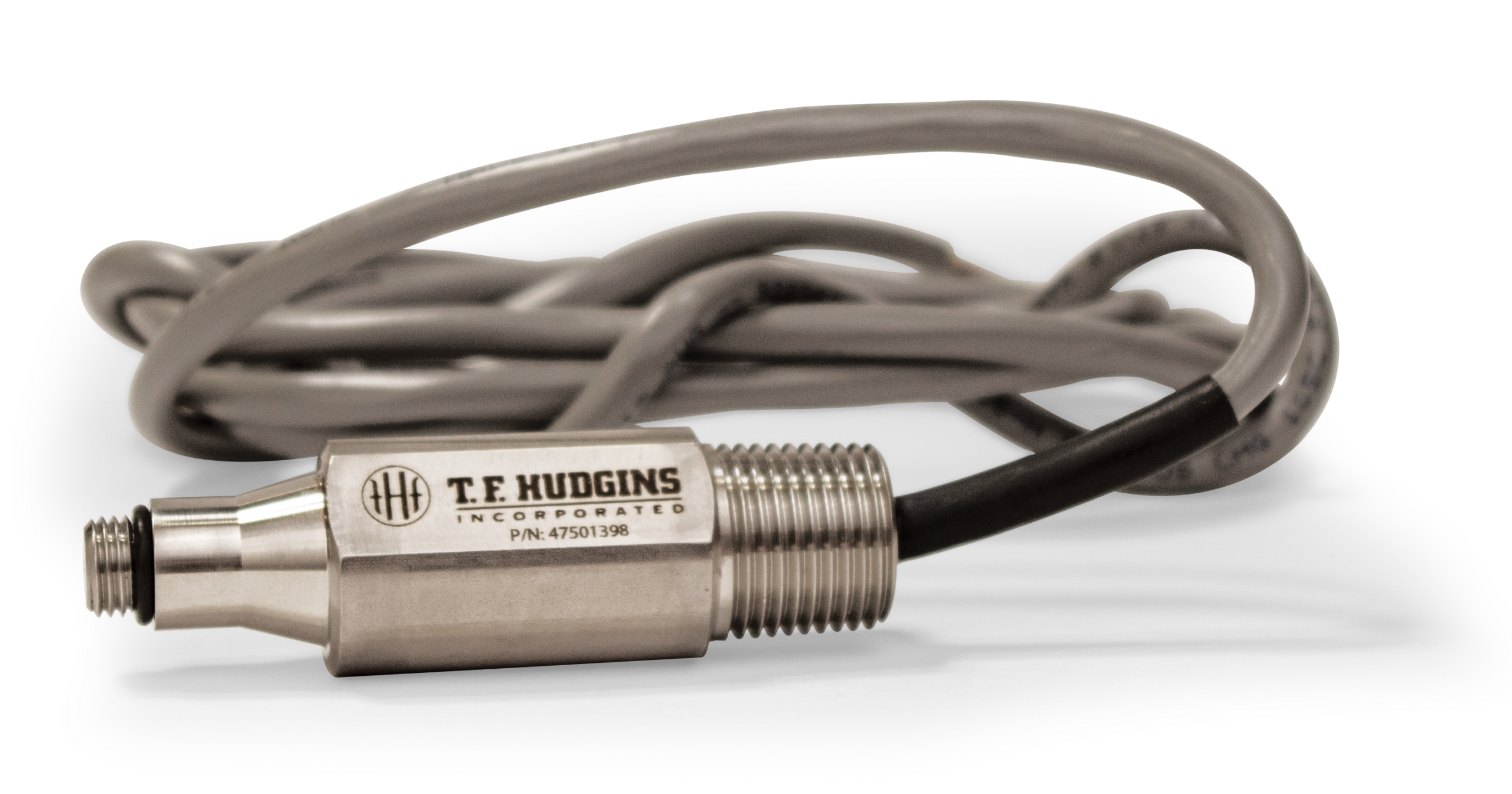 Industrial lubrication sensor from T.E. Hudgins, featuring a metal housing and connected wires, designed for precise monitoring of lubrication levels in machinery.