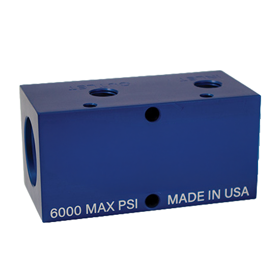 Industrial lubrication product featuring a blue block valve, marked with a maximum pressure rating of 6000 PSI, designed for high-performance applications, proudly made in the USA.