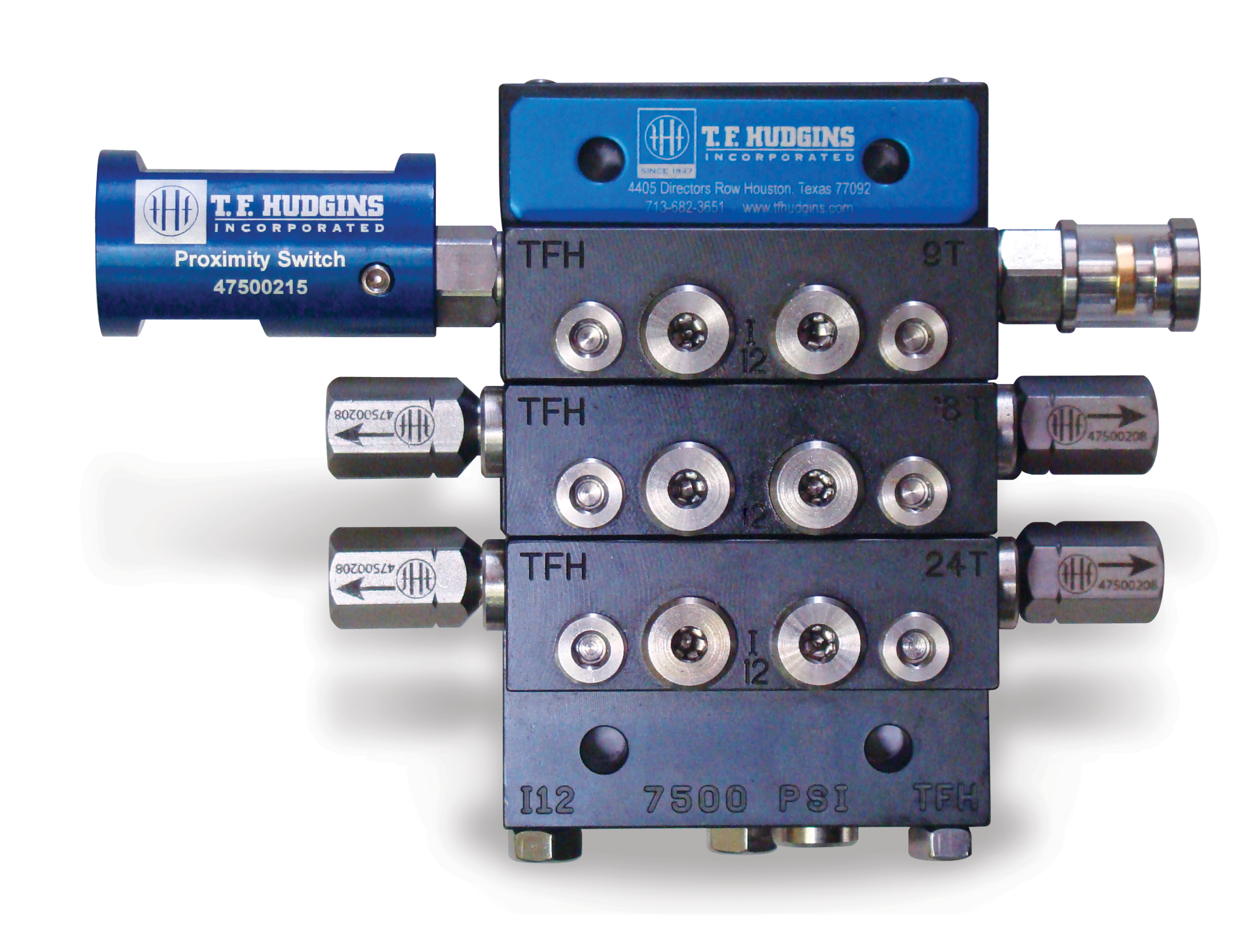 High-pressure lubrication system component featuring a proximity switch and multiple connection points, designed for circulating oil applications. T.F. Hudgins branding visible on the unit, indicating durability and precision engineering for industrial use.