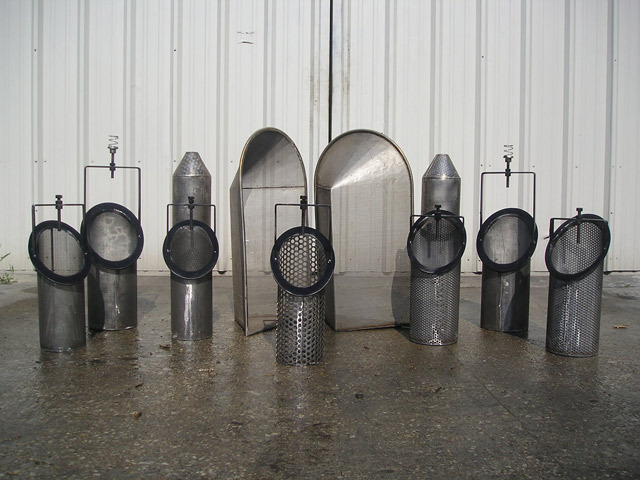 Various types of oil basket strainers displayed in a row, showcasing different designs and mesh sizes, made of stainless steel, against a neutral background. Ideal for filtration in oil applications.